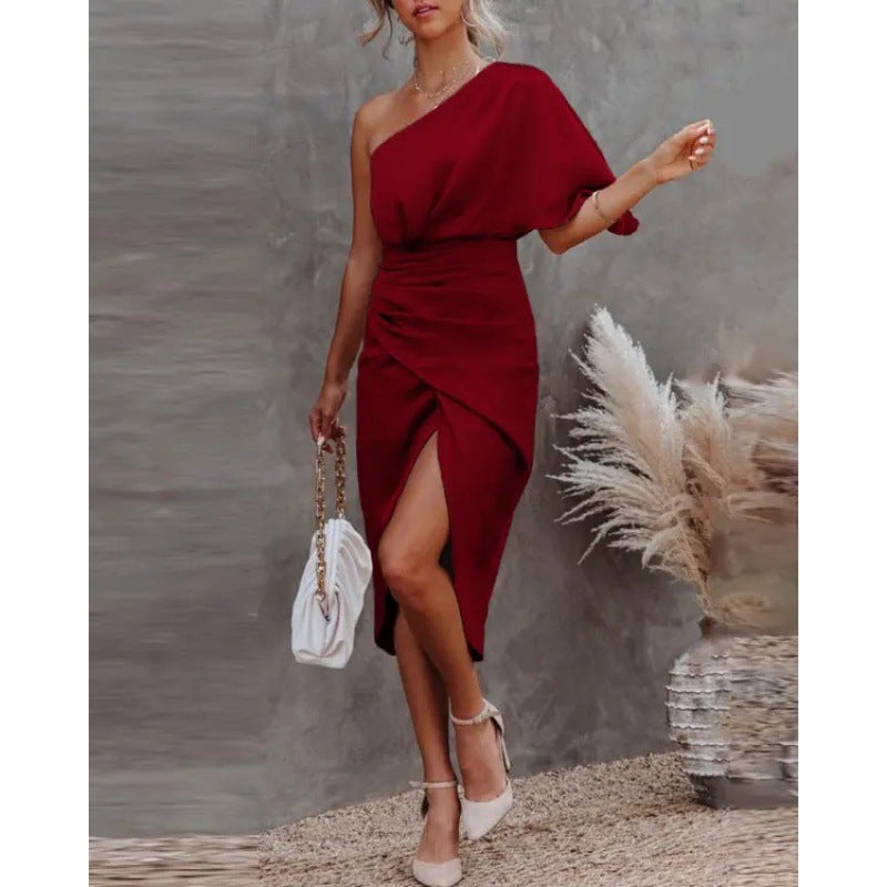 Ladies chic asymmetric evening gown with elegant slit and sophisticated draping