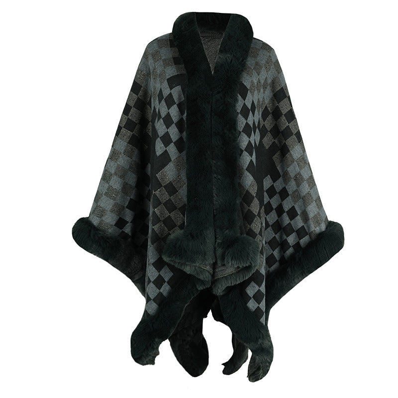 Ladies elegant knitted poncho with luxurious faux fur trim and geometric pattern