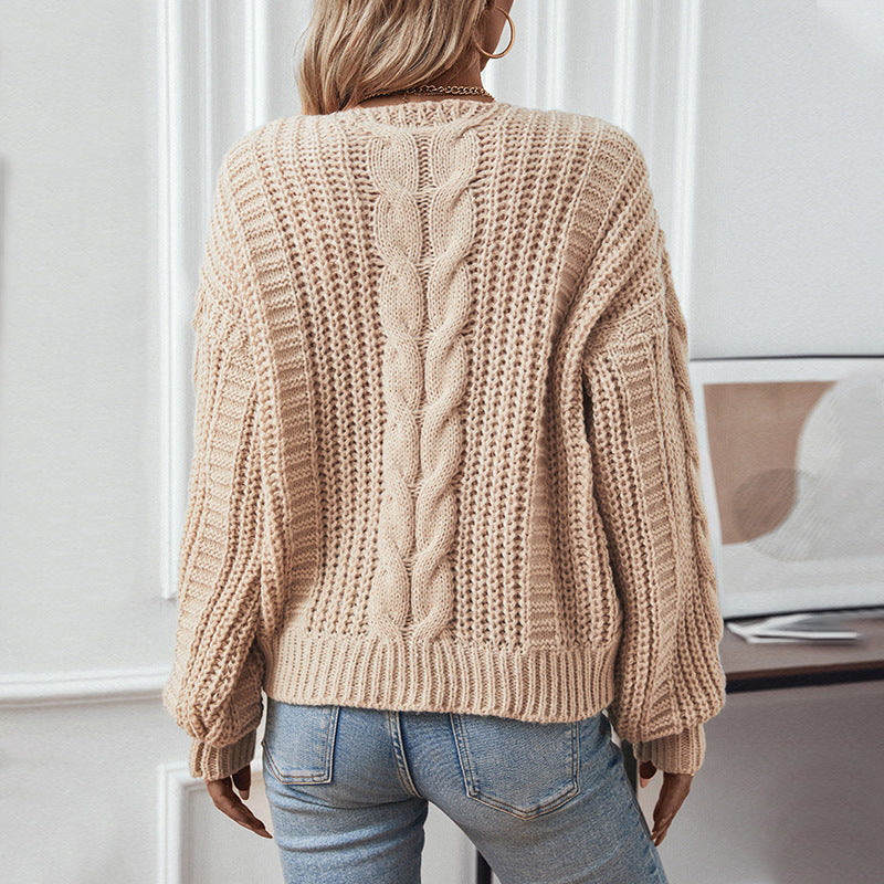 Ladies chunky knit pullover with oversized cut and cable pattern