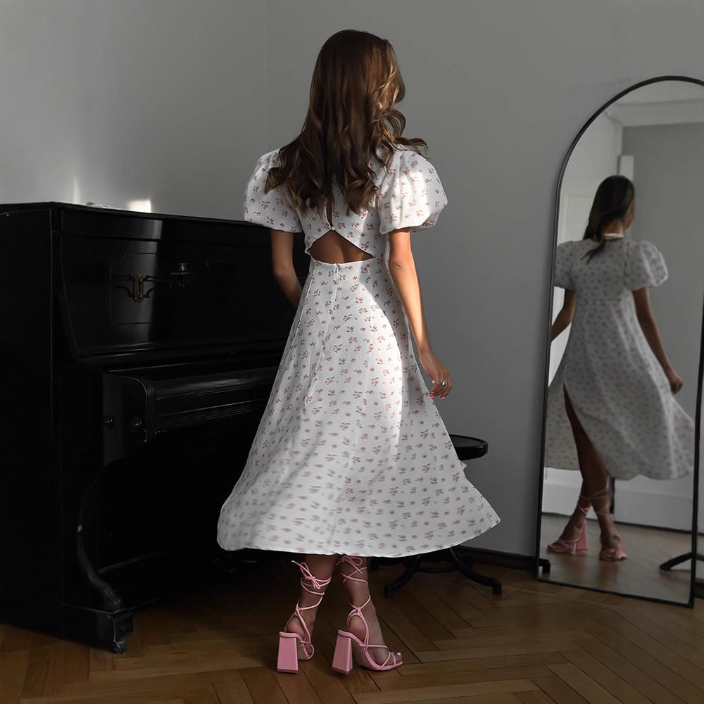 Women's midi dress with puff sleeves and side slit