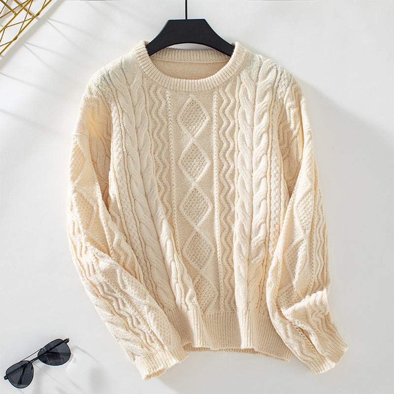 Women's chunky knit pullover with textured cable pattern