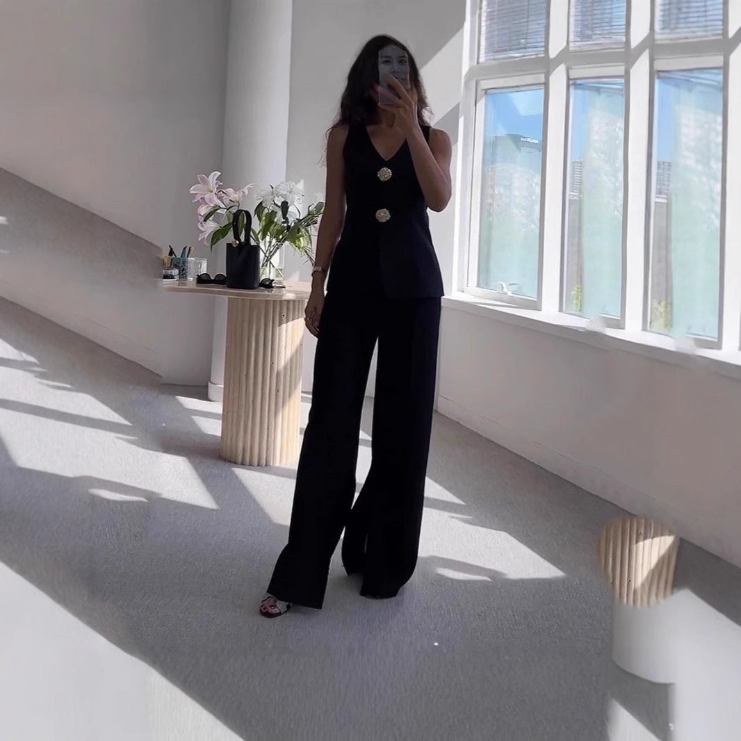 Ladies elegant pantsuit set with fitted blazer and wide-cut trousers