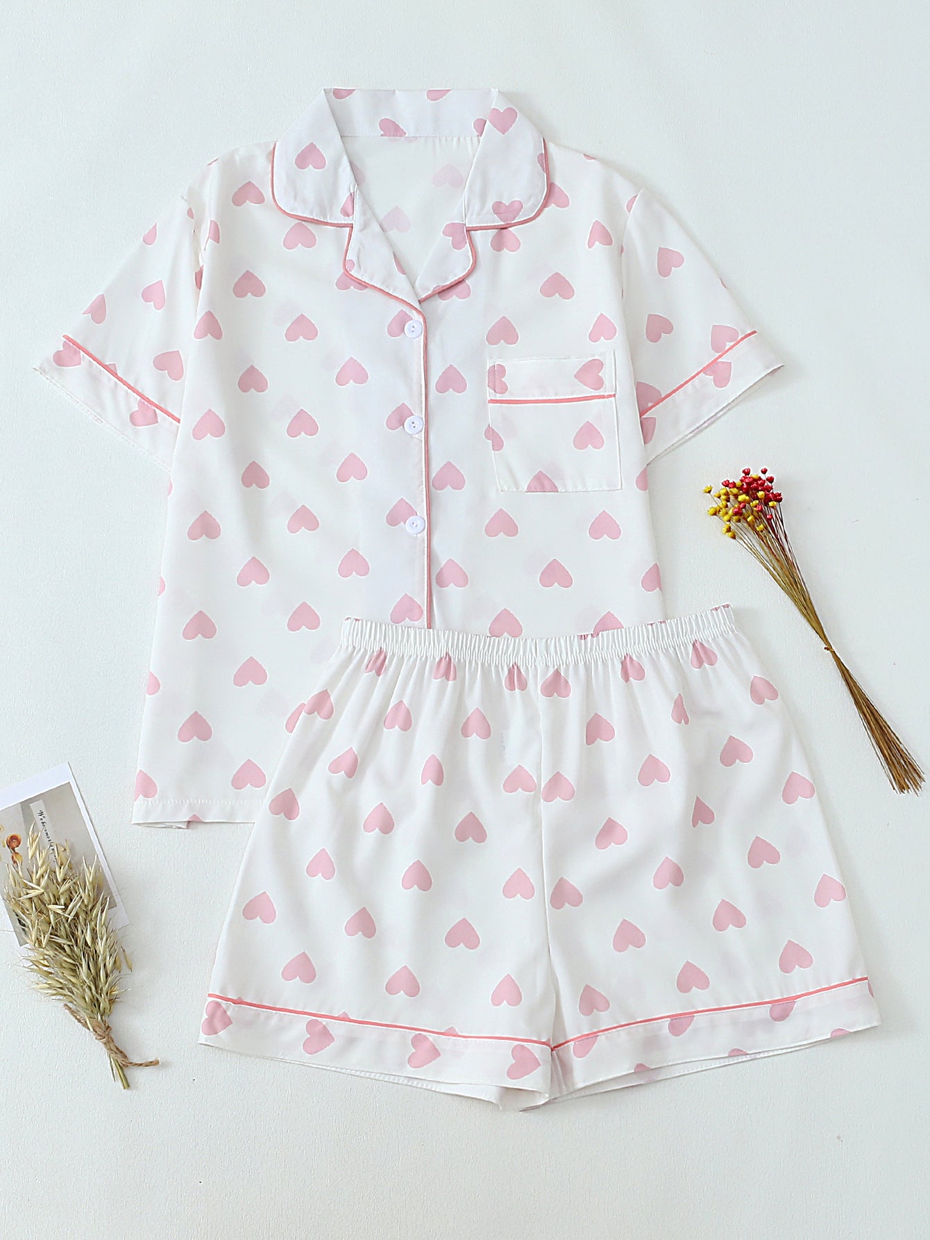 Women's pajama set with hearts and fine stripes