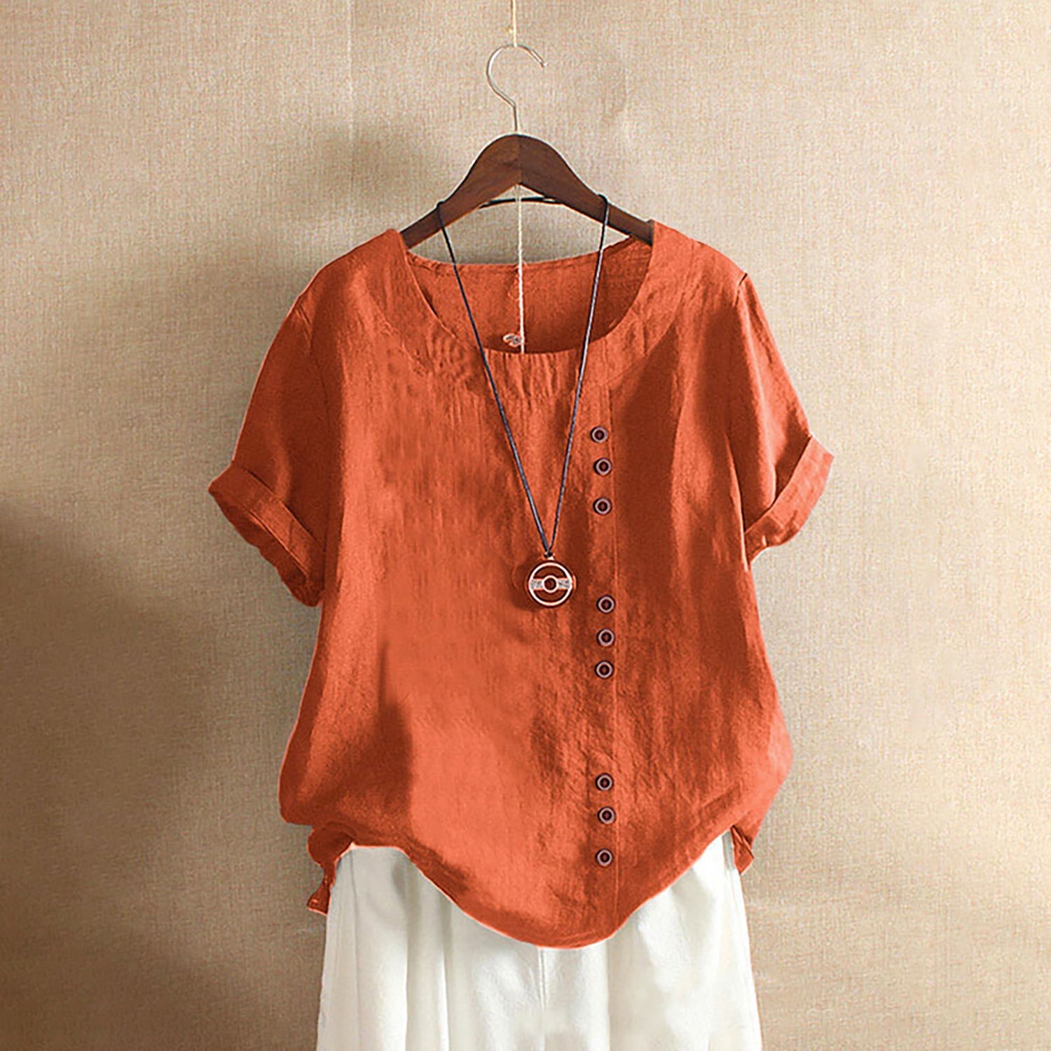 Women's casual linen blouse with convertible sleeves and button details