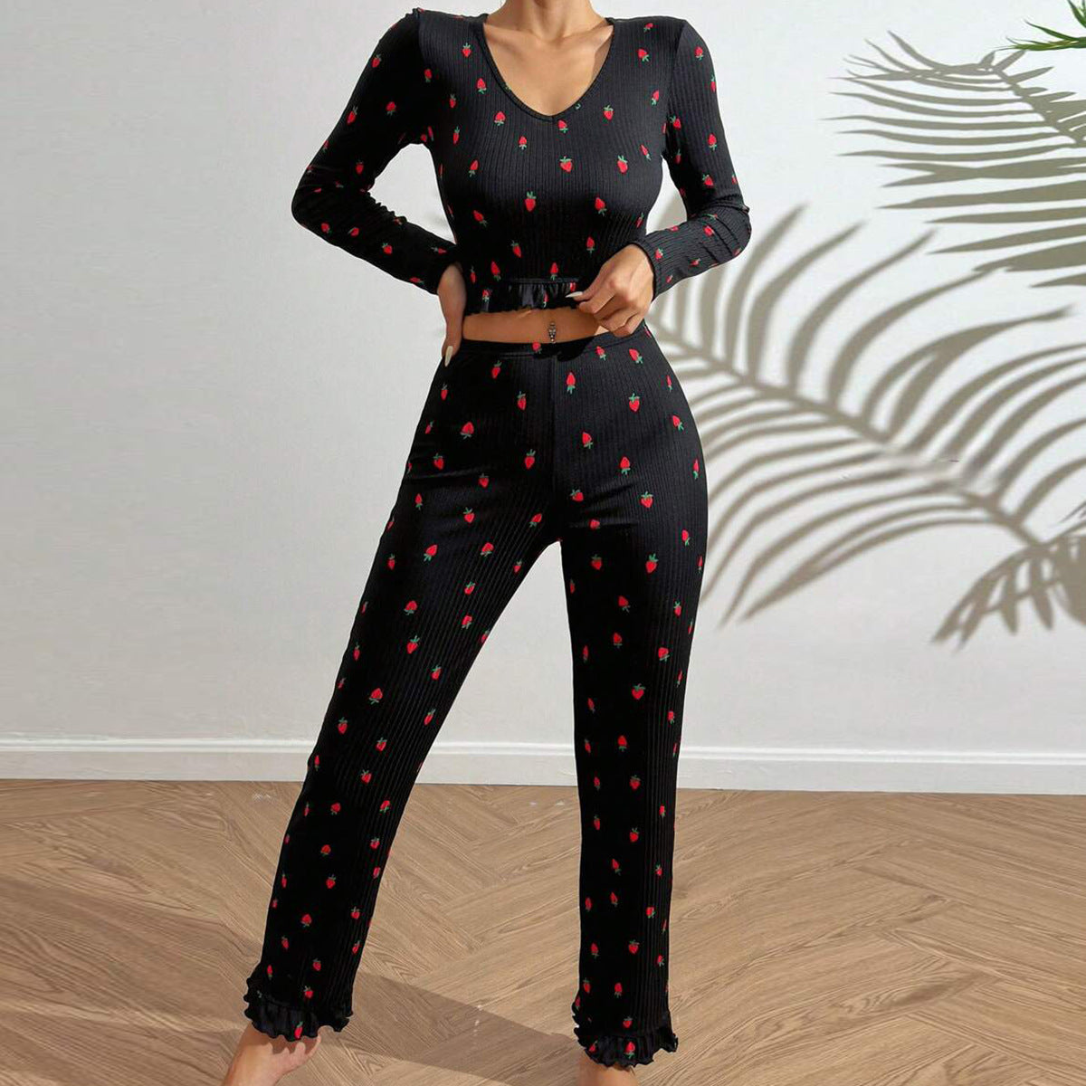 Women's casual pajama set with playful strawberry pattern