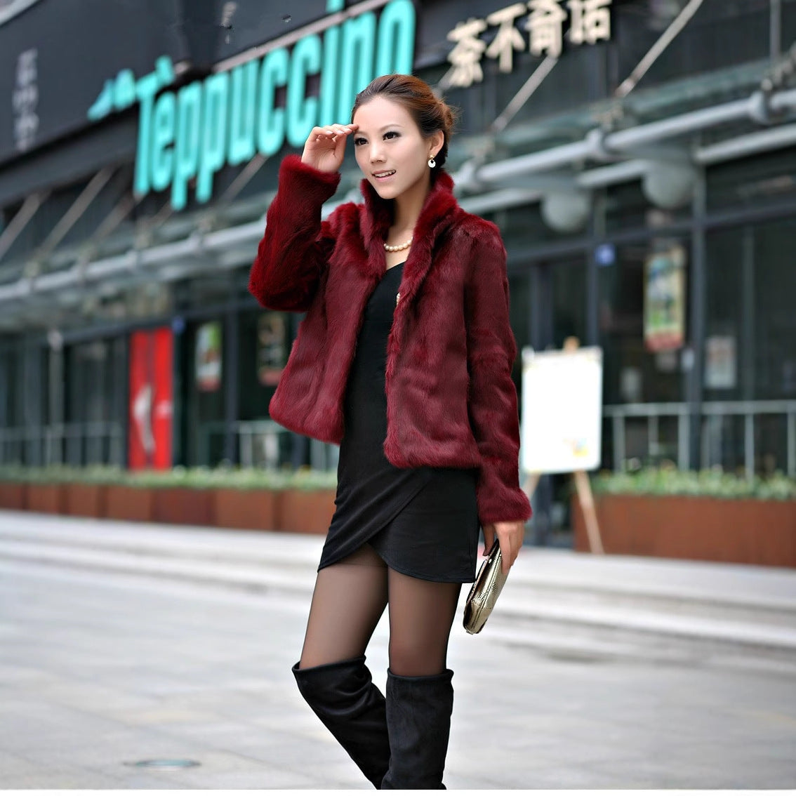 Ladies stylish short jacket made of the softest faux fur with wide lapels