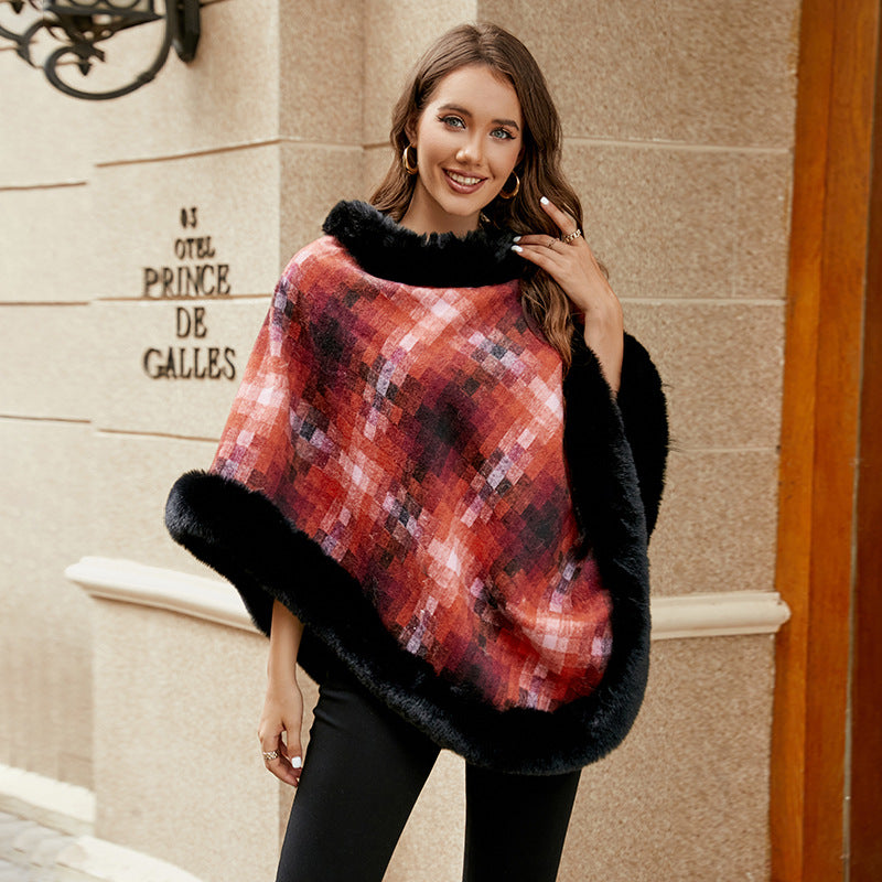 Ladies fashionable poncho with luxurious faux fur collar