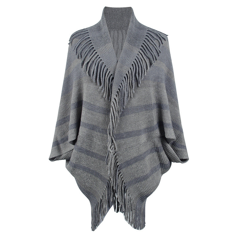 Women’s fashionable knitted poncho with casual fringe design and elegant structure