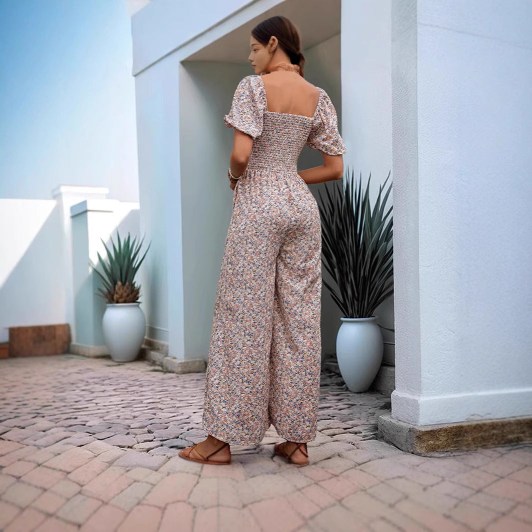 Women's floral patterned jumpsuit with puff sleeves and side pockets