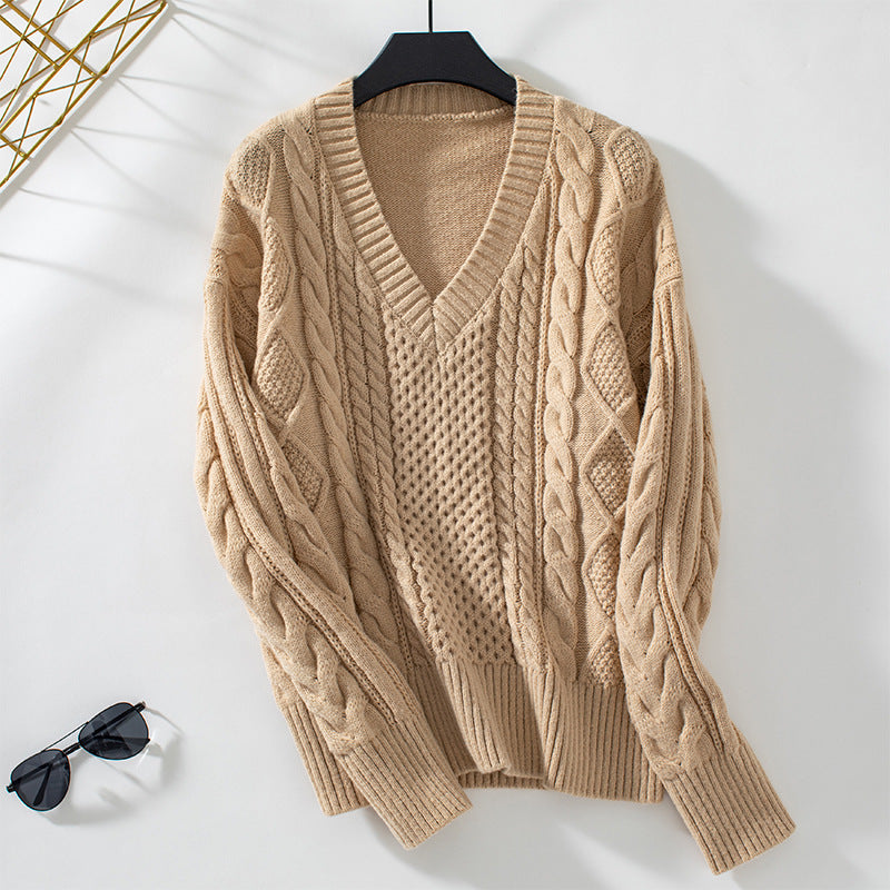 Women's fashionable knitted pullover with deep V-neck and cable pattern