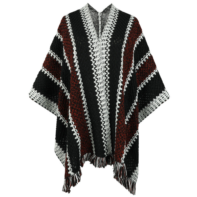 Women's knit poncho with V-neck and fringes