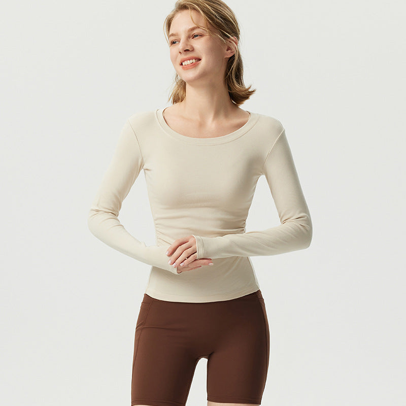 Women's fitted long sleeve shirt with gathering and seamless cut
