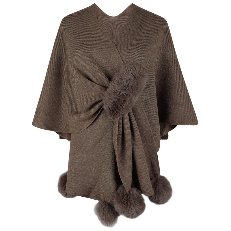Ladies elegant poncho with luxurious faux fur trim