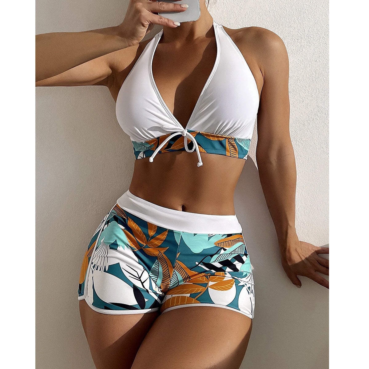 Women's sporty bikini set with braided top and patterned shorts