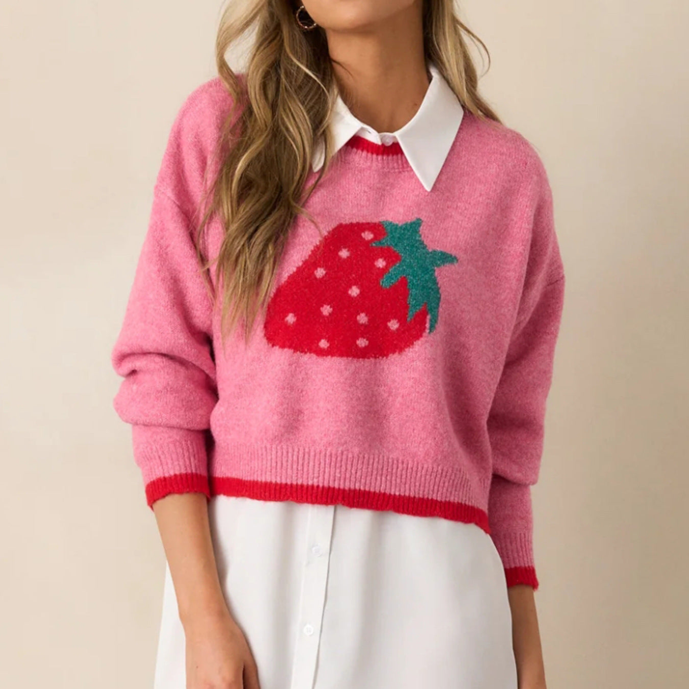 Women’s trendy pullover with strawberry motif and contrast cuffs