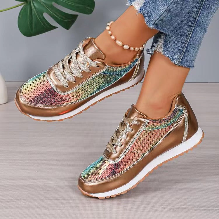 Ladies fashionable sneakers with shimmering upper material and non-slip sole