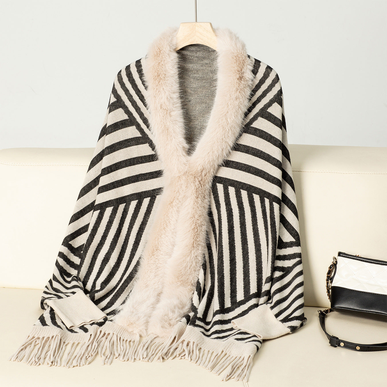 Women's Knit Poncho with Elegant Faux Fur Collar and Fringed Design