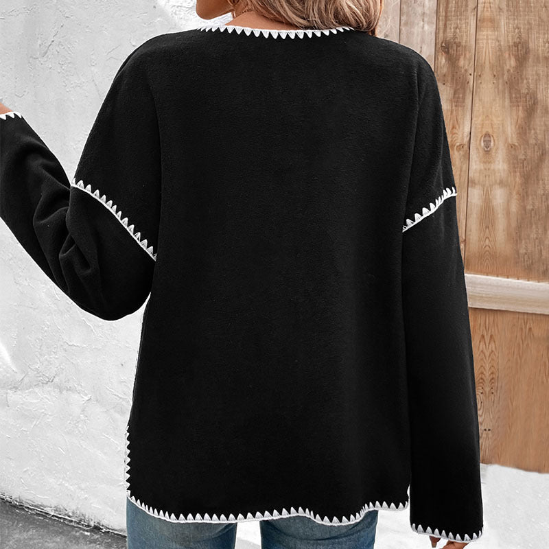 Women's casual cardigan with contrasting button details and patch pockets