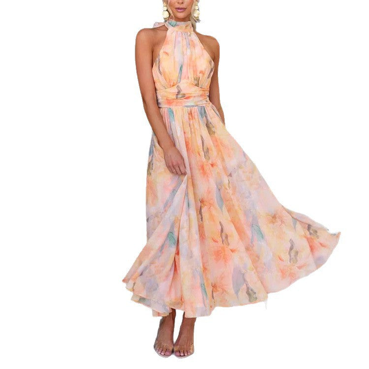 Women's max dress with flowing skirt and elegant halter neck