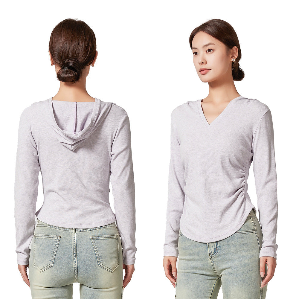 Ladies sporty top with hood and fitted cut