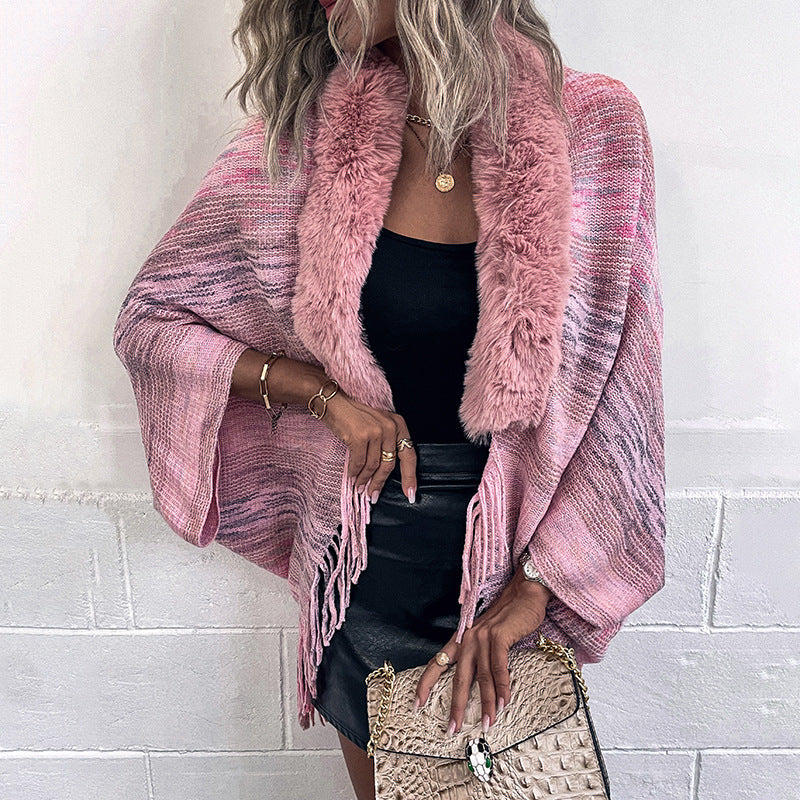 Women elegant poncho with luxurious faux fur collar and fringed hem