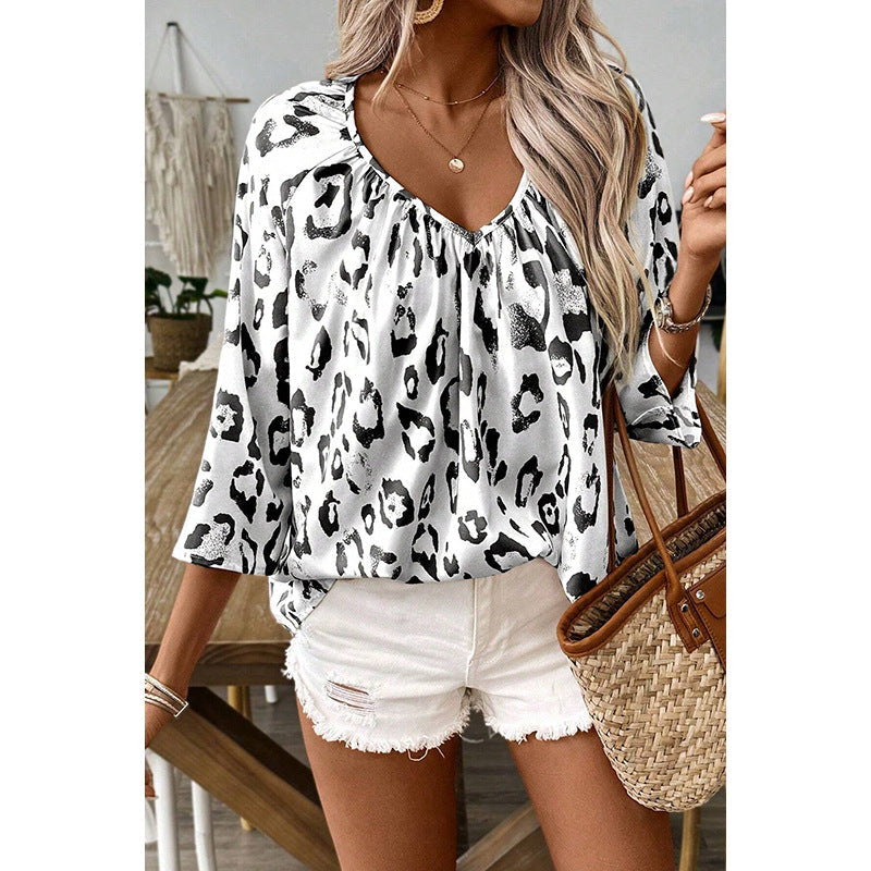 Ladies blouse top with a loose fit and chic leopard print