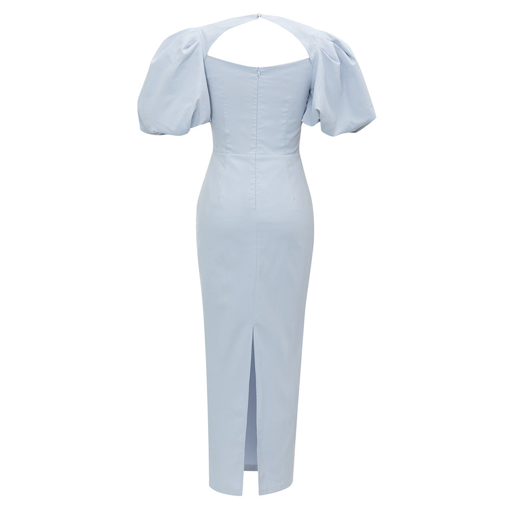 Women's Elegant Dress with voluminous puff sleeves and sophisticated cut-out decoration