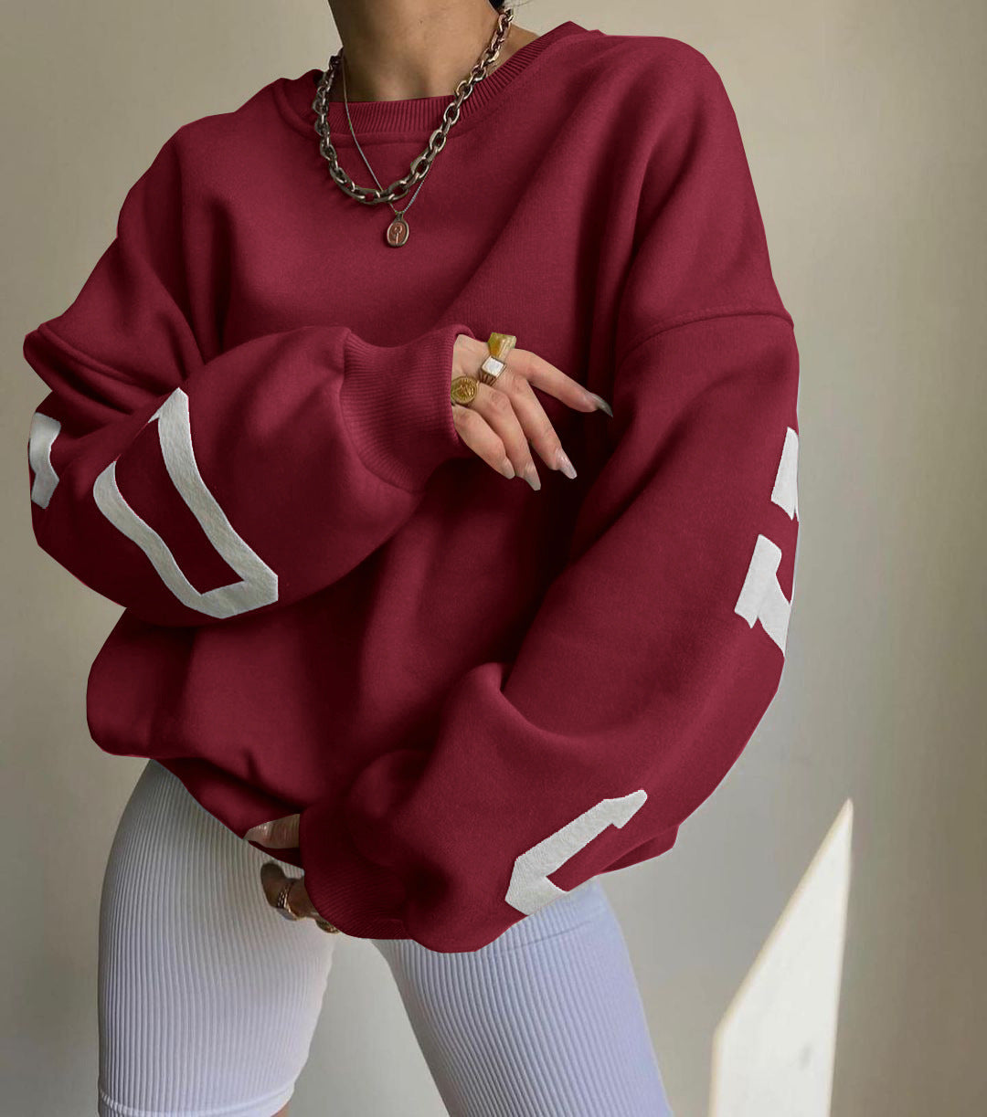 Women's casual oversized sweater with contrasting sleeves
