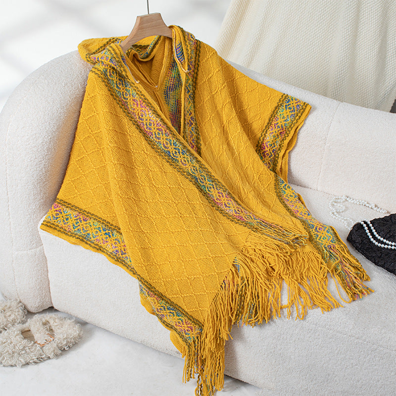 Women's elegant poncho with high-quality textured design and fringes