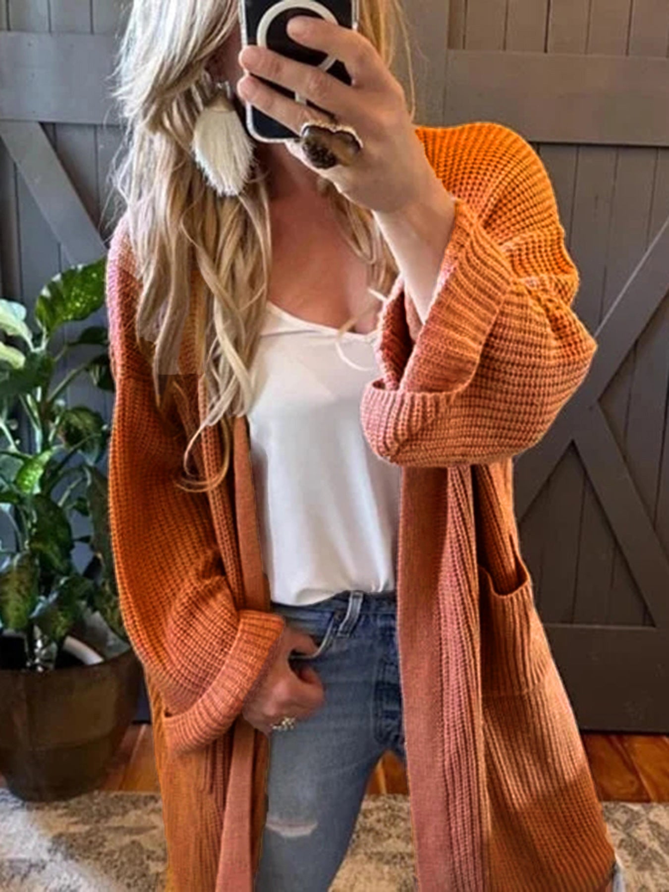 Women's airy cardigan with practical pockets and loose fit