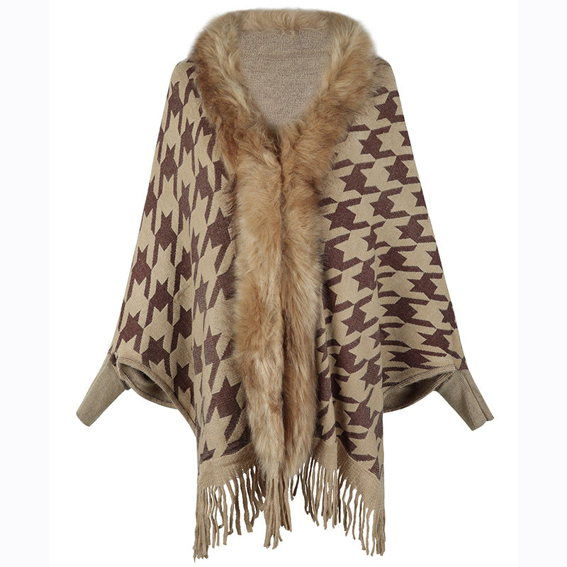 Ladies stylish poncho with exclusive fur trim and modern star pattern