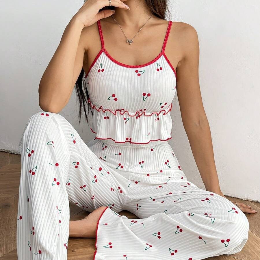Ladies pajama set with fruity strawberry pattern and ruffle details
