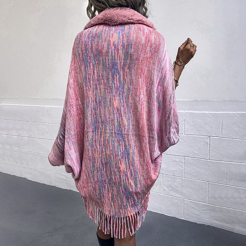 Women elegant poncho with luxurious faux fur collar and fringed hem