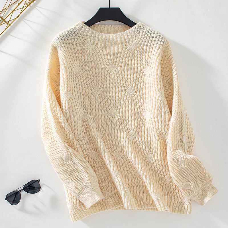 Women's chunky knit pullover with striking wave pattern