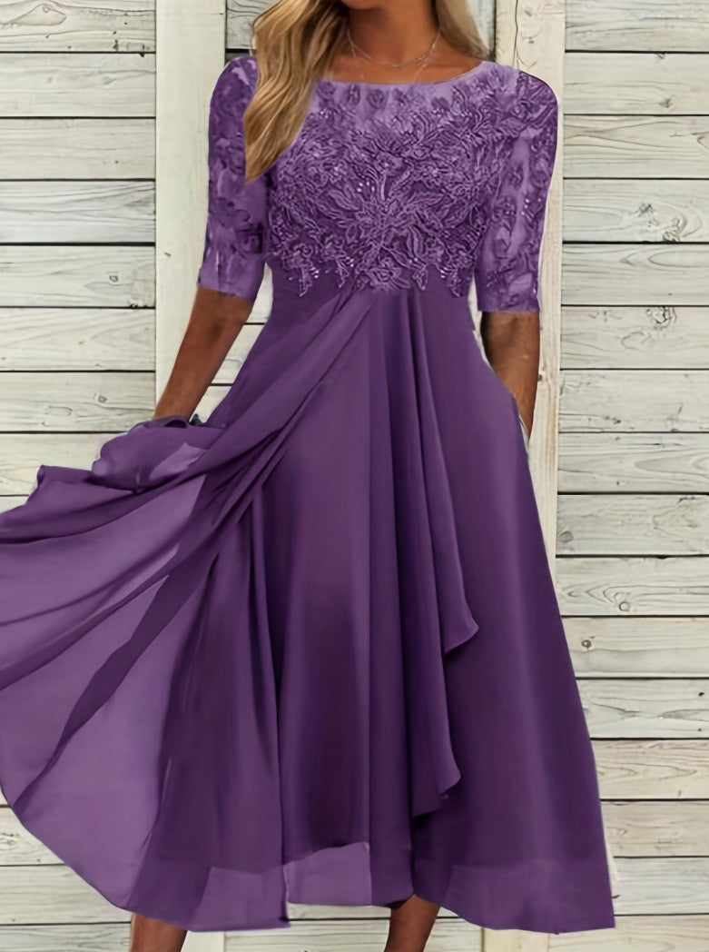 Women's elegant cocktail dress with floral lace top and flowing skirt