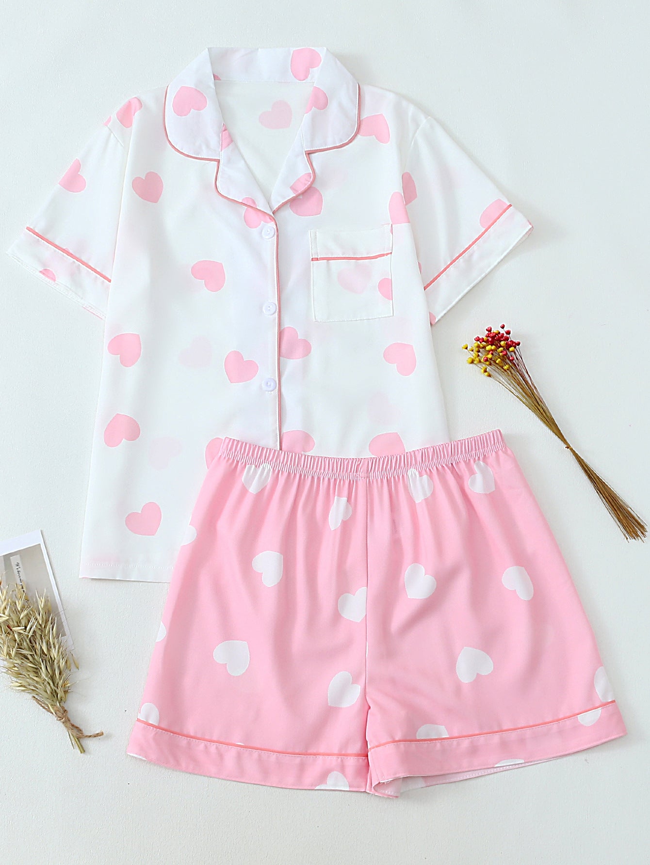 Women's pajama set with hearts and fine stripes