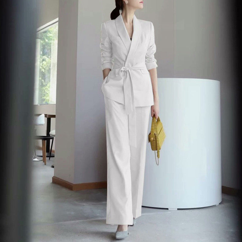 Women elegant tailored blazer and wide trouser suit