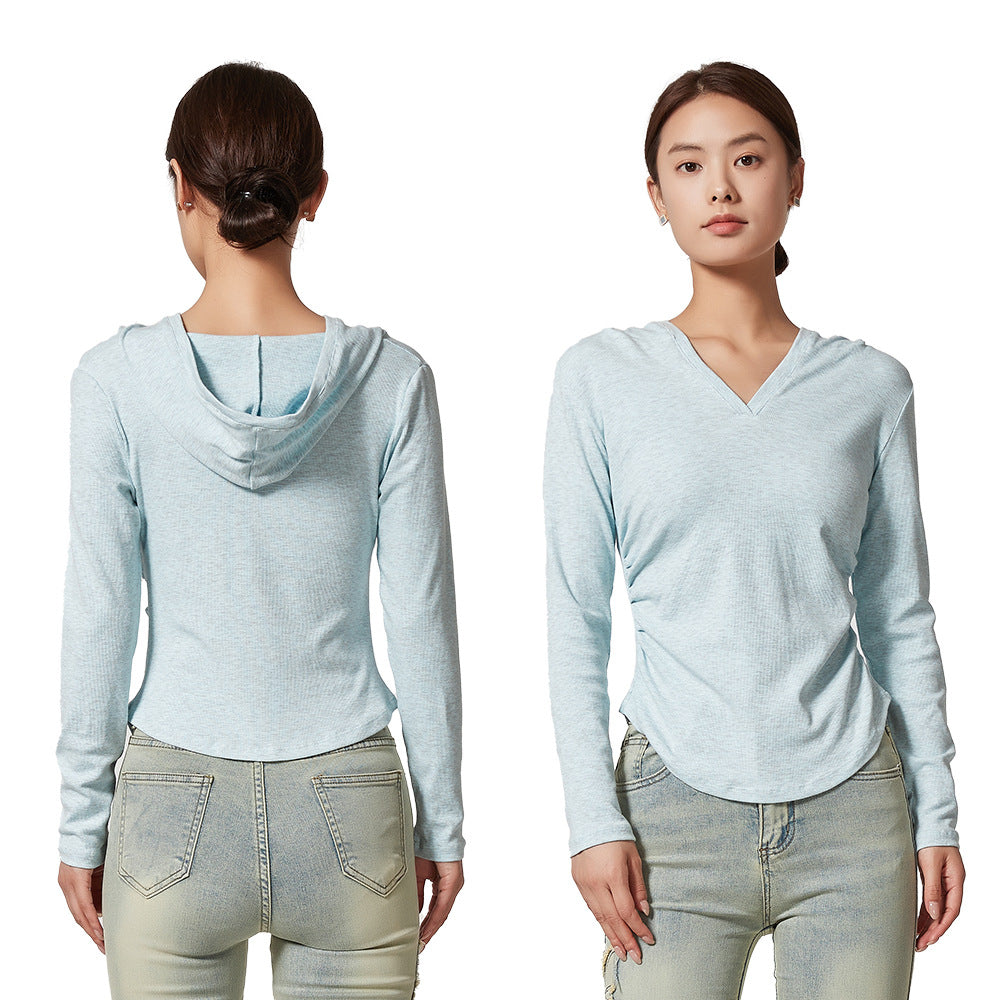 Ladies sporty top with hood and fitted cut