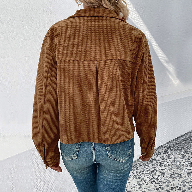 Ladies cropped jacket with textured fabric and practical pockets
