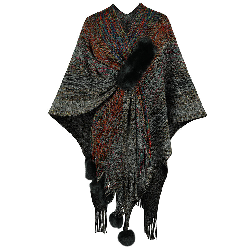 Ladies fashionable poncho with luxurious faux fur trim and creative fringes
