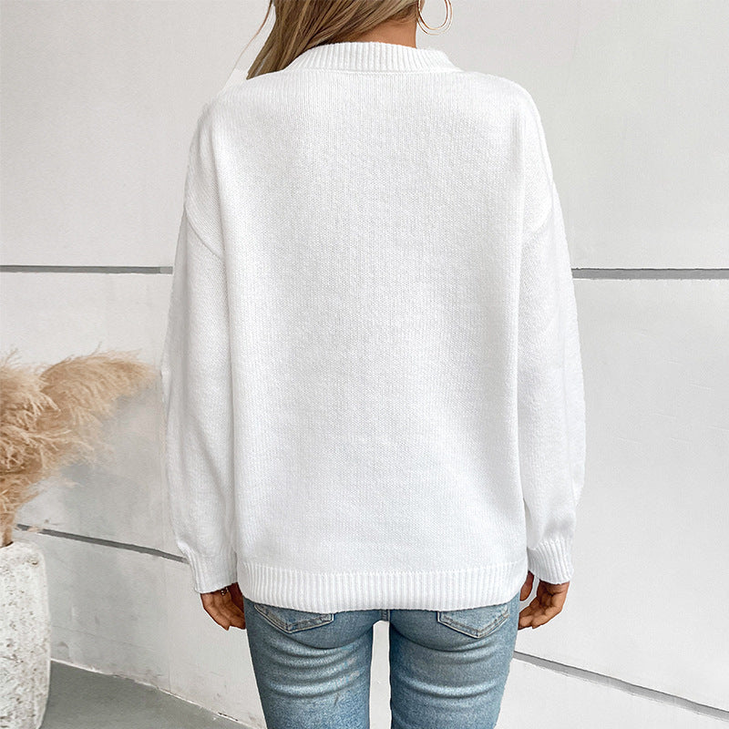 Ladies knit pullover with flag motif and round neckline