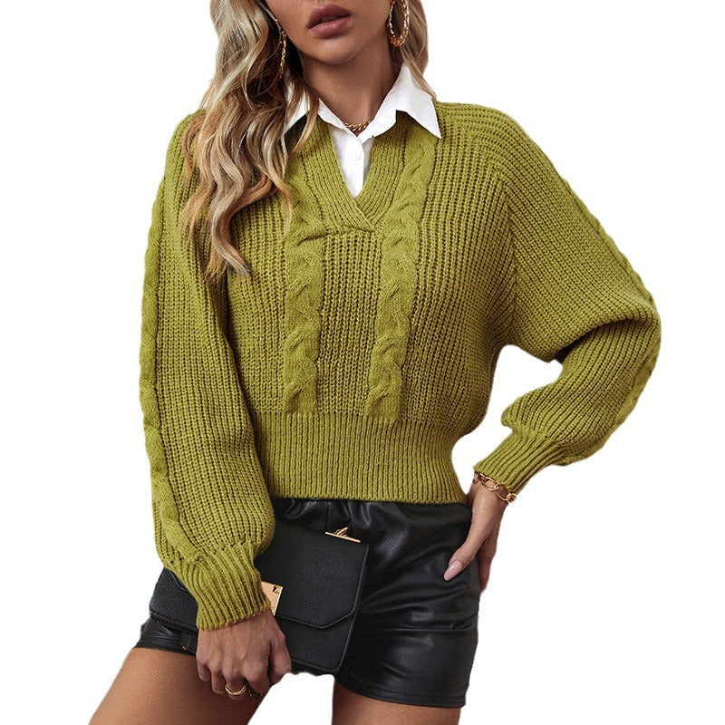 Women's knitted pullover with cable design and modern collar