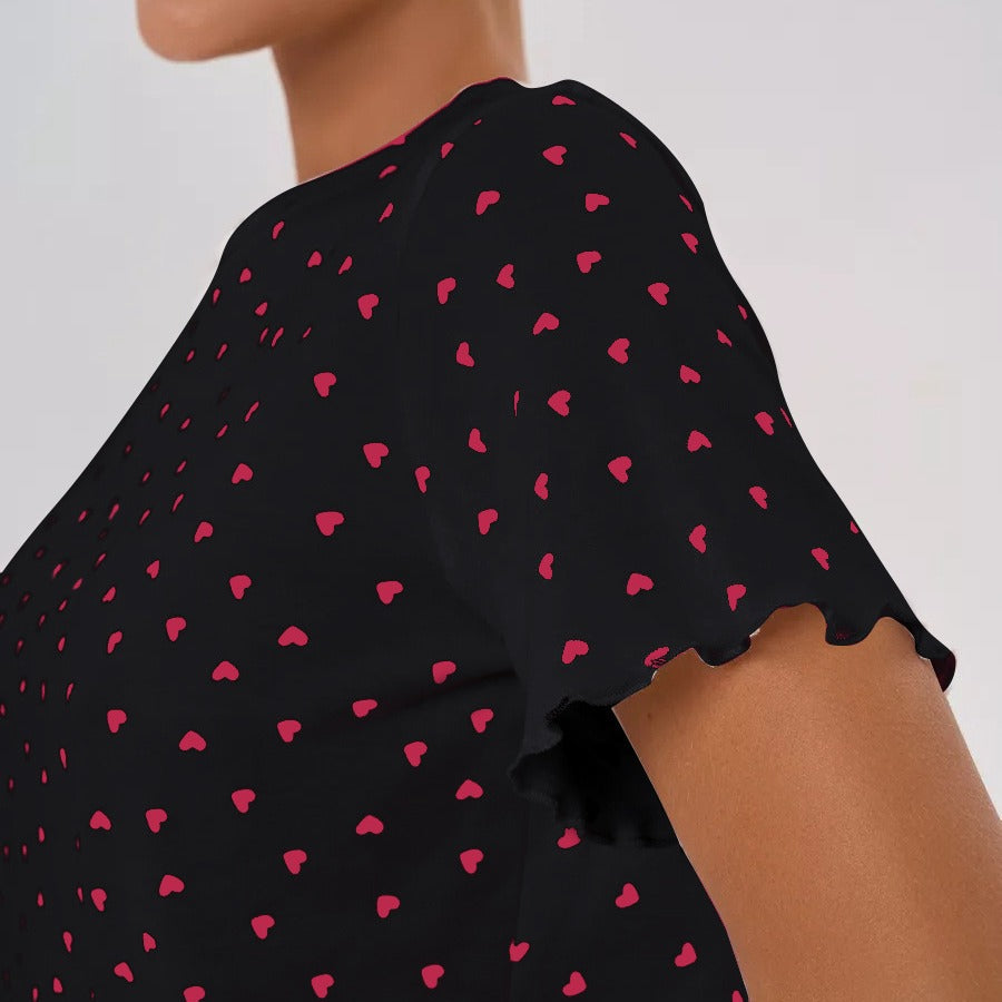 Women's pajama set with cheerful heart design and playful hem