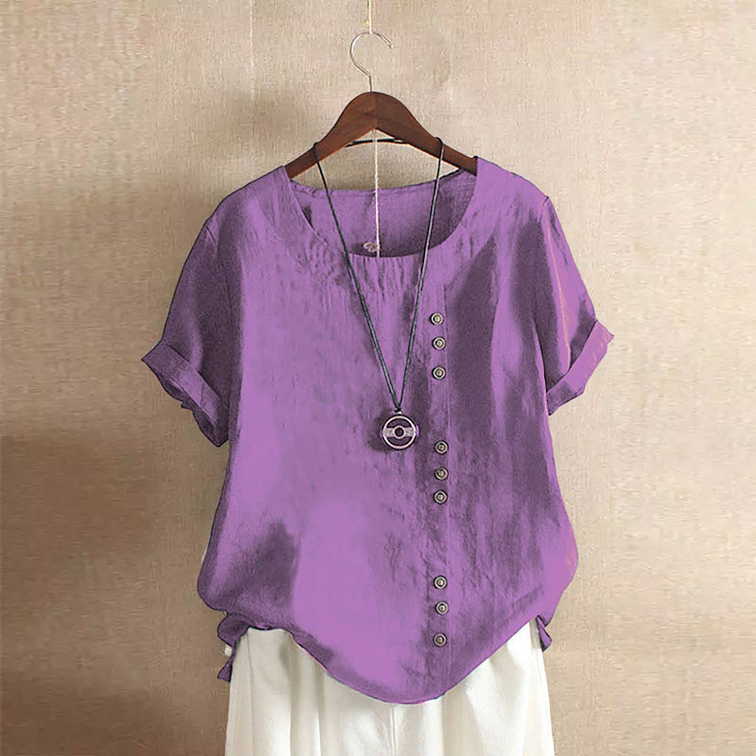 Women's casual linen blouse with convertible sleeves and button details