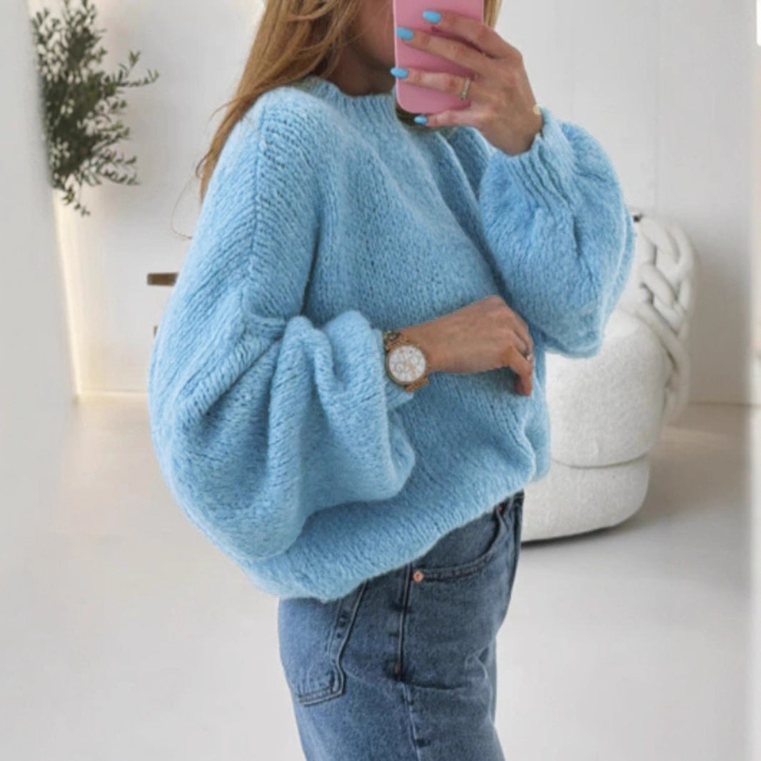 Women's cozy pullover with voluminous sleeves and textured design