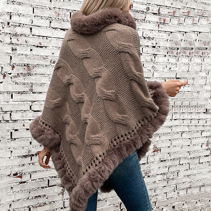 Women's cozy knit poncho with soft faux fur trim and cable knit pattern