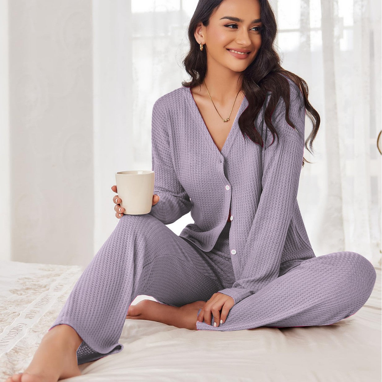 Women's pajama set with long sleeves and button placket
