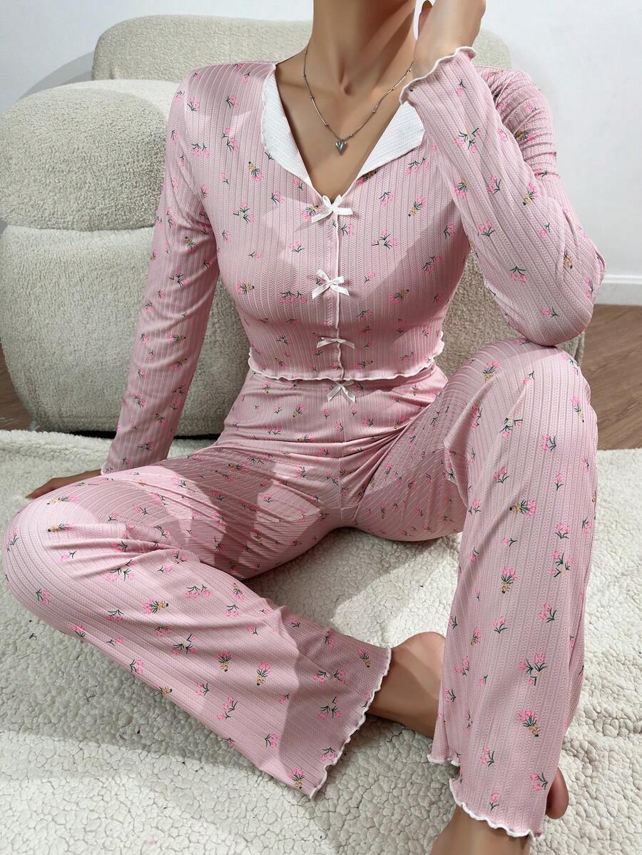 Women's pajama set with delicate ruffle and floral pattern