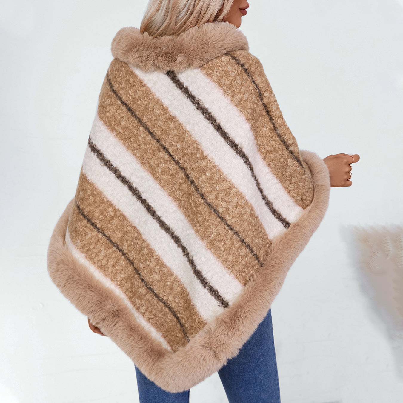 Ladies elegant poncho with luxurious fur trim