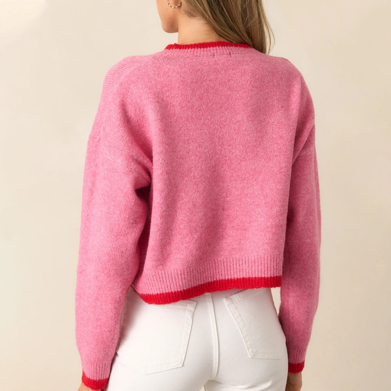 Women’s trendy pullover with strawberry motif and contrast cuffs